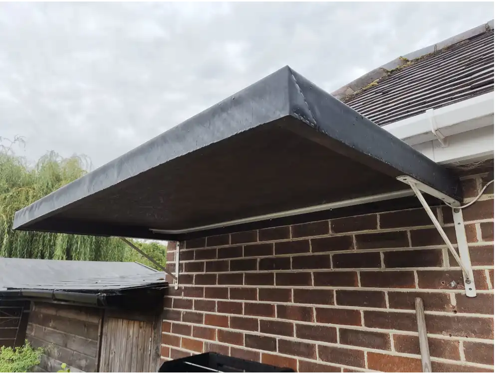 rubber roof over BBQ Mal builds an EPDM rubber roof over a BBQ cooking area.