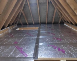 Mal installing loft insulation
