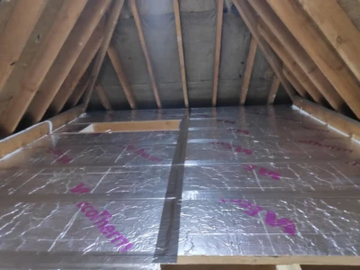 Mal installing loft insulation