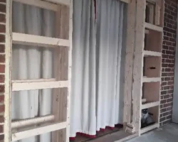 Mal builds a pocket sliding door into the new extension lounge
