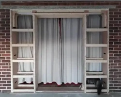 Mal builds a pocket sliding door into the new extension lounge