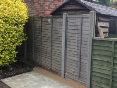 Mal builds a concrete foundation for the shed