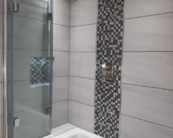 Mal's finished bath and concealed shower, and mozaic niche and feature.