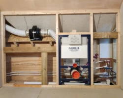 Mal's pre-finished ventilation design, concealed toilet frame and plumbing pipework