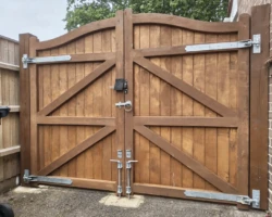 Mal measures orders and installs a driveway gate