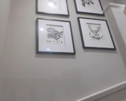 4 theme pictures that were carefully hung with proportional consideration